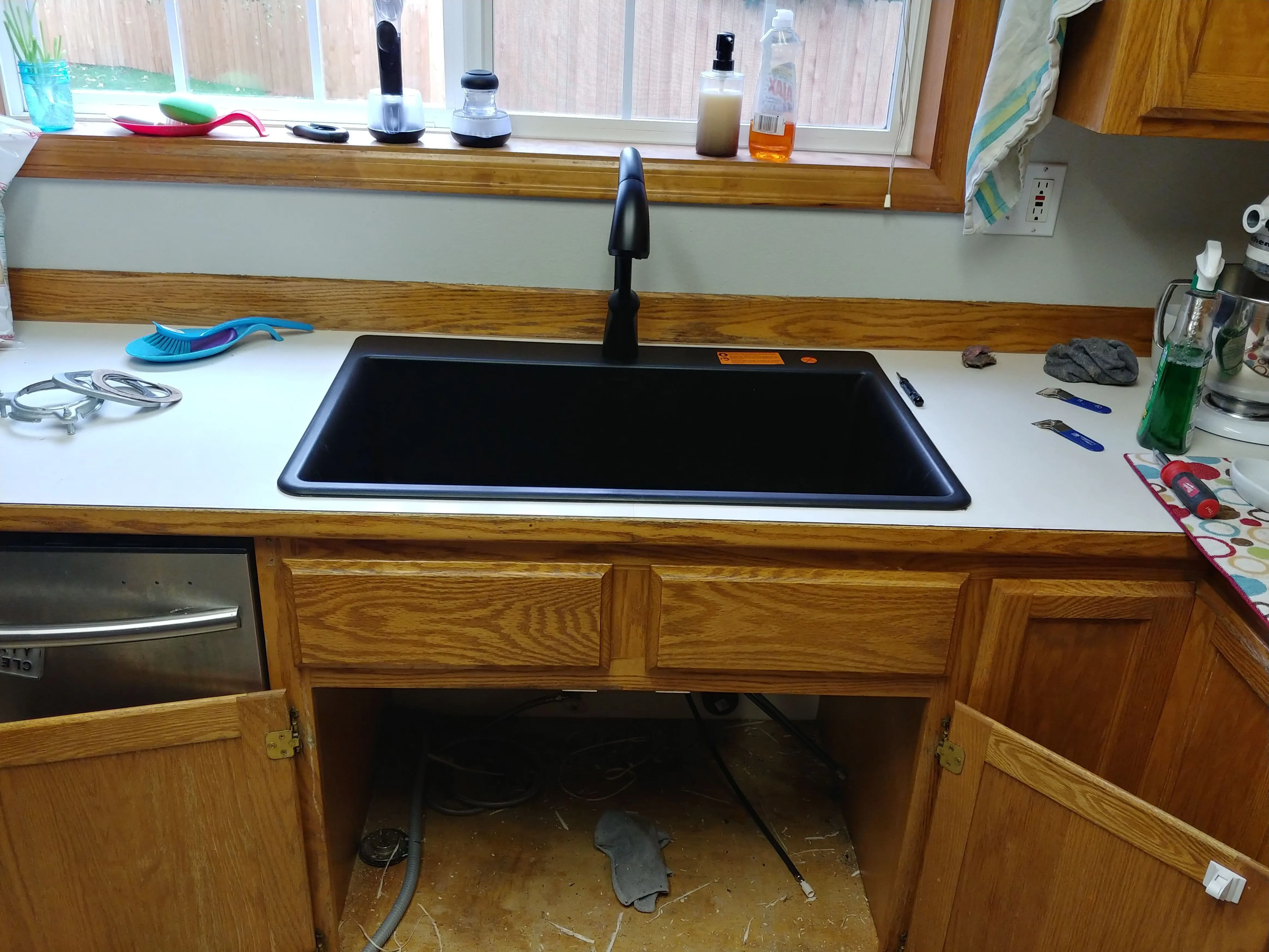 newly installed black, single-basin sink