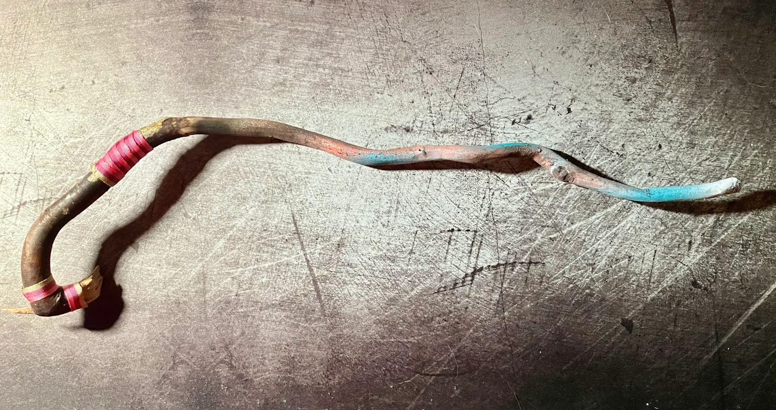 a wand with mystical power against a grungy background